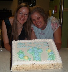 Darlene & Leslie with the 4 year anniversary birthday cake